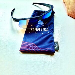 Oakley Black Frame with Blue Mirrored Lenses Sport Sunglasses